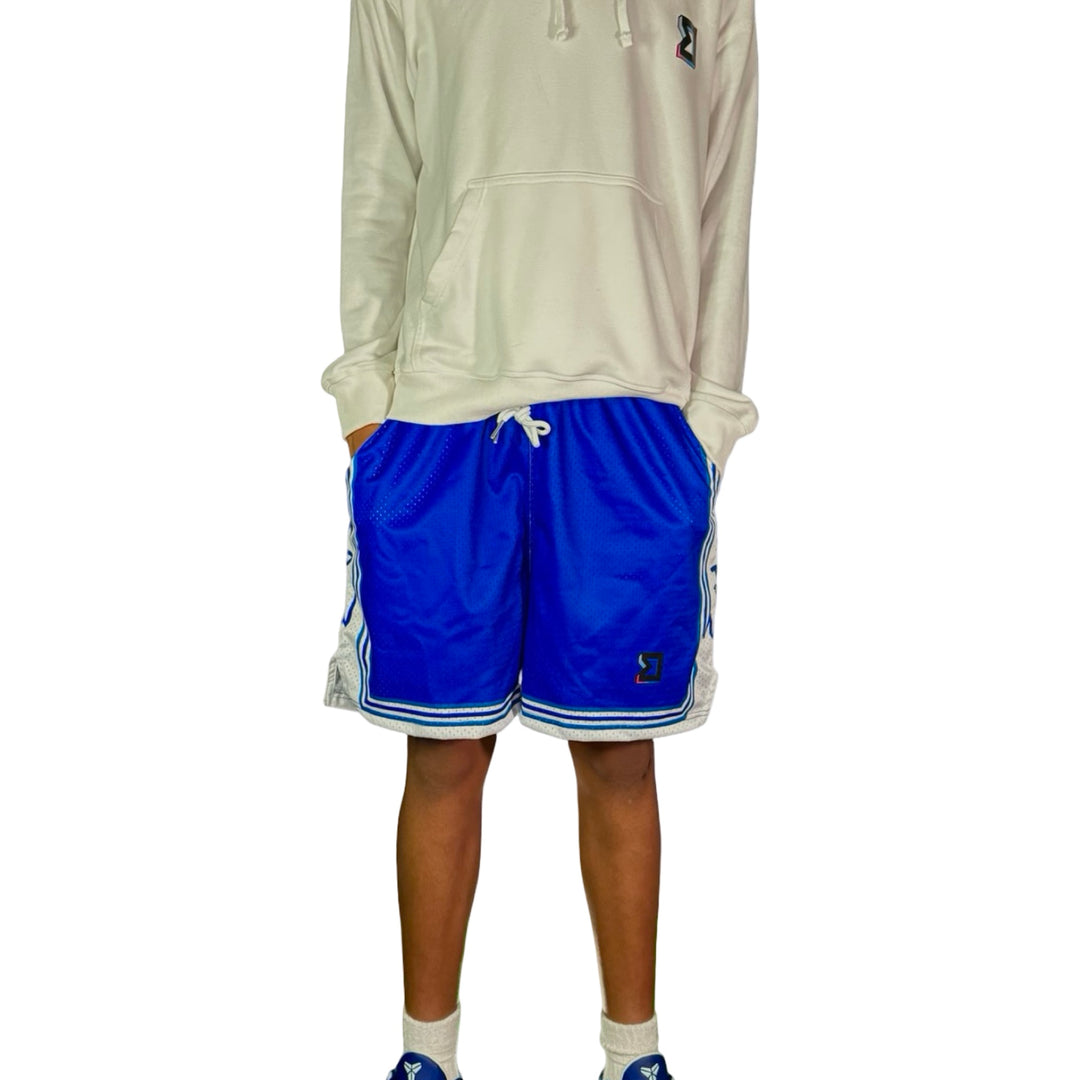 Person wearing a white hoodie and blue shorts