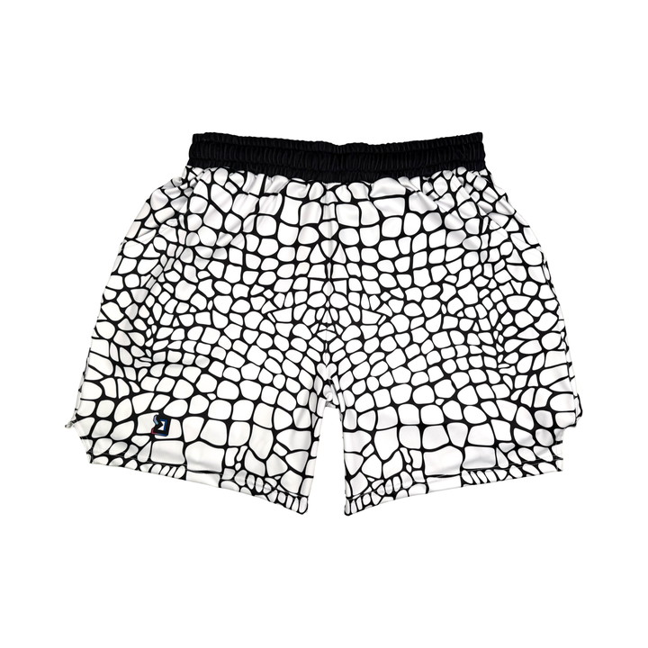 Yt Fang Soft Quick-Dry basketball shorts in white and black reptile-scale pattern with above-knee cut and signature Trap’N Shorts logo.