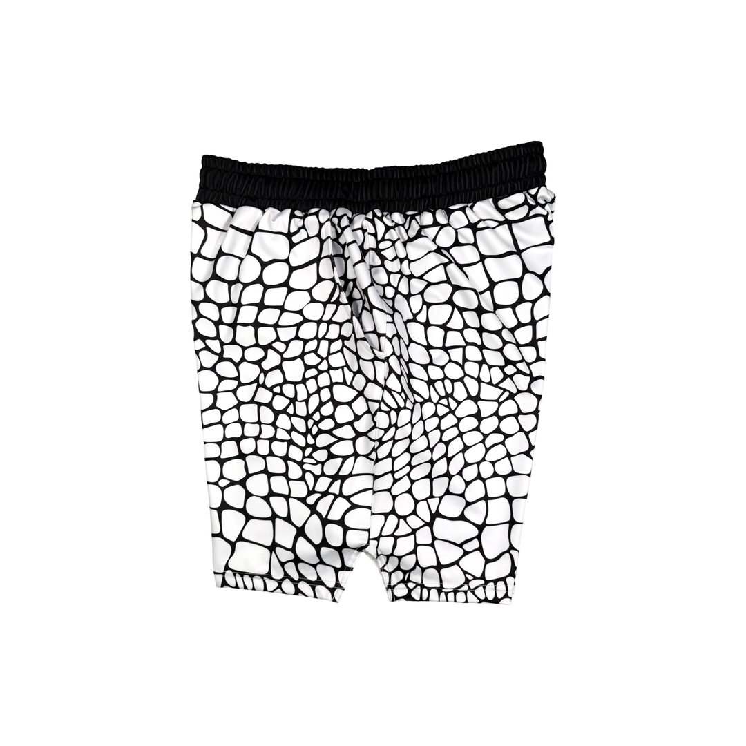 Yt Fang Soft Quick-Dry basketball shorts in white and black reptile-scale pattern with above-knee cut and signature Trap’N Shorts logo.